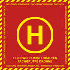 Roter und gelber Helipad-Schild auf Fireandkisses BOS Feuerwehr Drohnen Landeplatz
